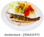 Delicious grilled seabass seasoned with olive oil, herbs, and garlic, paired with crispy colorful fresh salad, elegantly presented on white dining plate. Isolated over white background