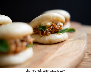 Delicious Gua bao stuffed with meat up close