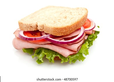Delicious ham sandwich with whole wheat bread on white background - Shutterstock ID 48700597