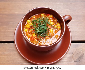 Delicious healthy bean soup cooked at home in a large ceramic mug - Powered by Shutterstock