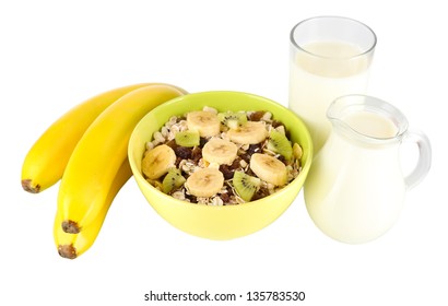 Delicious And Healthy Cereal In Bowl With Milk And Fruit Isolated On White