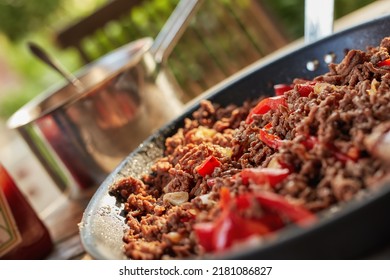 A Delicious Healthy Meal With Cooked Beef Meat And Pepper Vegetables. Flavorful Recipe For A Juicy Dish Served For Dinner At A Restaurant. Texture Detail Of Tasty Homemade Food In A Pan On A Table