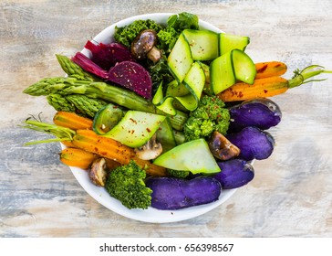 Delicious And Healthy Salad With Colorful Vegetables. Rainbow Food.