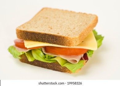 A Delicious And Healthy Sandwich Turkey Ham Cheese Lettuce Tomato And Onion