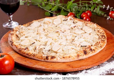 delicious heart of palm pizza on wooden table