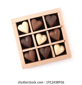 Delicious Heart Shaped Chocolate Candies In Box Isolated On White, Top View