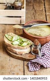 Delicious Homemade Chicken Liver Pate On Sourdough Bread. Bruschetta With Cucumber, Pepper And Liver Paste. Wooden Background, Rustic Style