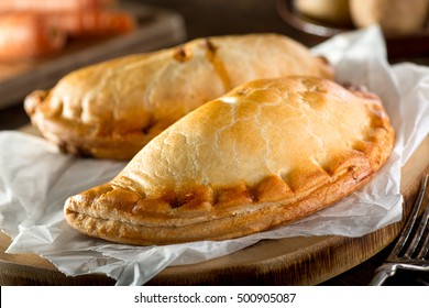 Delicious homemade Cornish pasties with beef, carrot, and potato.