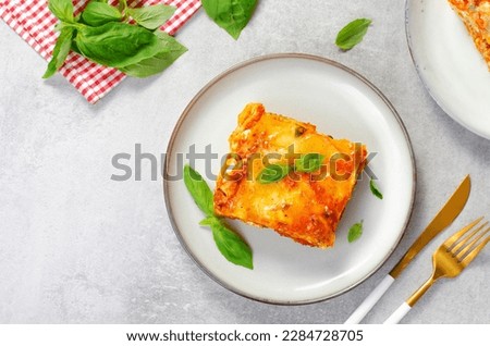 Delicious Homemade Lasagna with Bolognese Sauce on Bright Background, Italian Cuisine, Traditional Baked Lasagna Foto stock © 