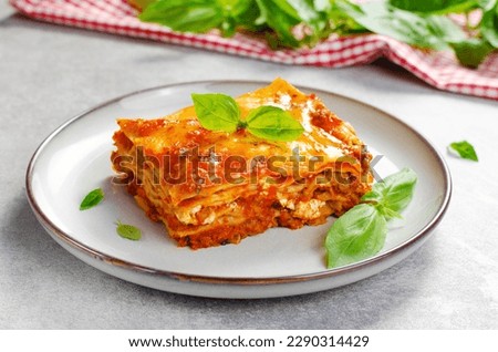 Delicious Homemade Lasagna with Bolognese Sauce on Bright Background, Italian Cuisine, Traditional Baked Lasagna Foto stock © 