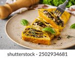 Delicious Homemade Omelette: Fresh Ingredients with Cheese, Mushrooms, and Vegetables.