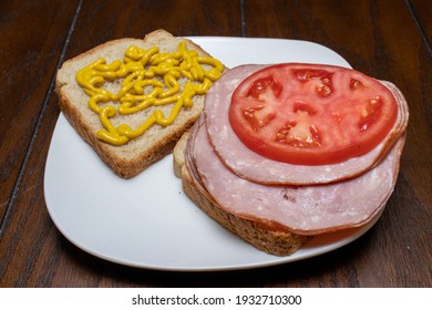 Delicious Honey Ham Sandwich With Tomato And Mustard On Wheat