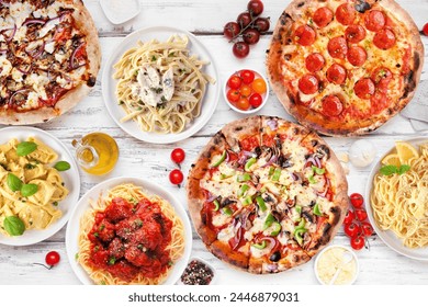 Delicious Italian food table scene. Assortment of pizzas and pastas. Above view on a white wood background. - Powered by Shutterstock