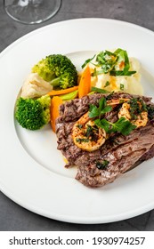 Delicious Juicy Grilled Steak And Shrimp With Grilled Broccoli And Cauliflower.  Surf And Turf Style. 