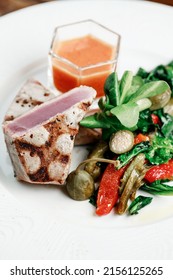 Delicious And Juicy Grilled Tuna Steak With Roasted Peppers, Spinach And Tomato Salsa