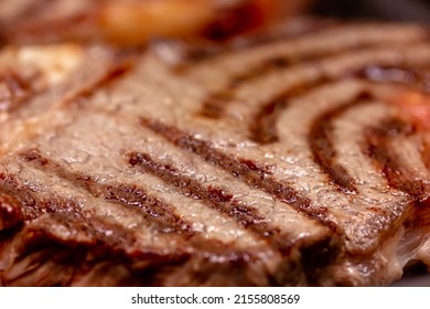 Delicious Juicy Meat Steak Cooking On Grill. Prime Beef Fry On Electric Roaster, Rosemary, Black Pepper, Salt. Slow Motion.