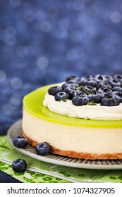 Delicious Key Lime Cheesecake Decorated With Fresh Blueberries