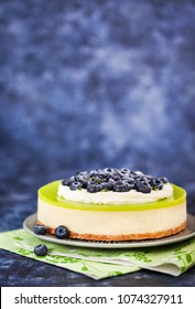 Delicious Key Lime Cheesecake Decorated With Fresh Blueberries