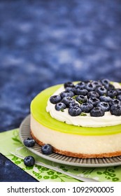 Delicious Key Lime Cheesecake Decorated With Fresh Blueberries