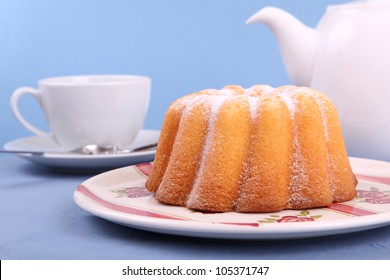 A delicious lemon cake on blue background