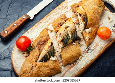 Delicious mackerel baked in dough. Fish baked in bread loaf - Shutterstock ID 2209385629