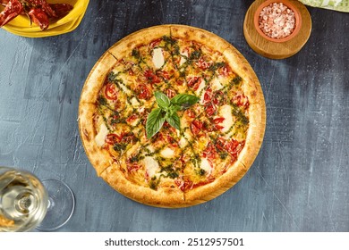 Delicious Margherita Pizza with Pesto Sauce on Wooden Board - Authentic Italian Cuisine. - Powered by Shutterstock