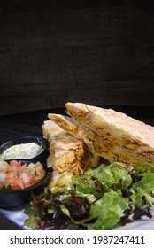 Delicious Mexican Quesadilla With Chicken Stuffing And Vegetable Salad