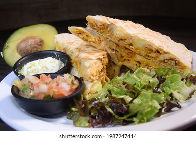 Delicious Mexican Quesadilla With Chicken Stuffing And Vegetable Salad