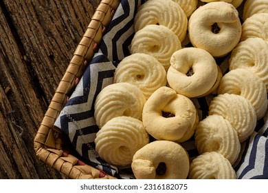 

Delicious mini butter flavored milk and guava cookies with a cup of coffee served in elegant jars on top of a rustic wood or white marble table, top view and selective focus - Shutterstock ID 2316182075