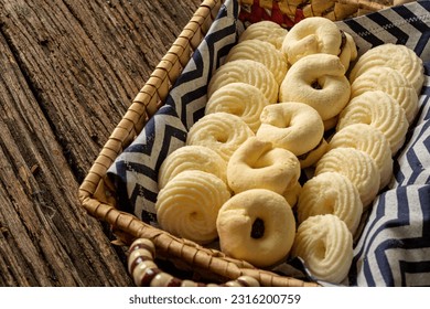 

Delicious mini butter flavored milk and (Sequilhos) guava cookies with a cup of coffee served in elegant jars on top of a rustic wood or white marble table, top view and selective focus - Shutterstock ID 2316200759