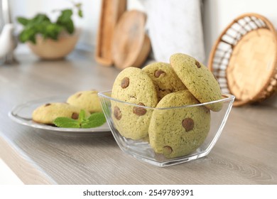 Delicious mint chocolate chip cookies on wooden table - Powered by Shutterstock