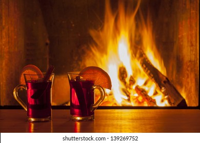 Delicious Mulled Wine At Romantic Fireplace Firelight Only