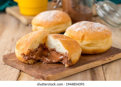 Delicious Nutella Surprise Donut Side View And White Background. Images