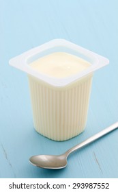 Delicious, Nutritious And Healthy Fresh Plain Yogurt Cup. On Vintage Retro Styling.