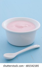 Delicious Nutritious And Healthy Fresh Plain Yogurt Cup. On Vintage Retro Styling.