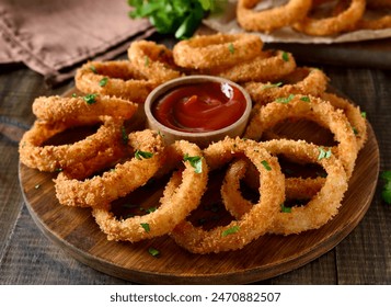 Delicious onion rings with tomato sauce