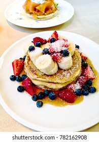 delicious pancake stack with honey