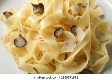 Delicious Pasta With Truffle Slices On Plate, Above View