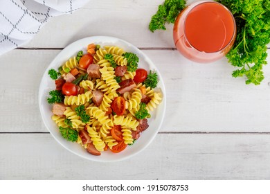 Delicious Pasta With Vegetables And Cut Ham. Top View.