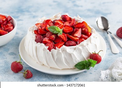 Delicious Pavlova cake with fresh strawberry, seective focus