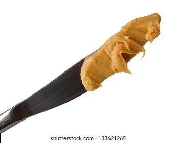 Delicious Peanut Butter On Knife Isolated On White Close-up