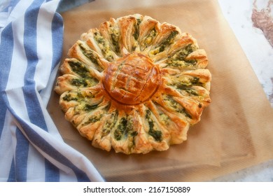 Delicious Pie With Spinach And Ricotta Cheese In The Shape Of A Sunflower