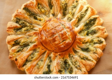 Delicious Pie With Spinach And Ricotta Cheese In The Shape Of A Sunflower