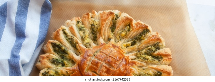 Delicious Pie With Spinach And Ricotta Cheese In The Shape Of A Sunflower