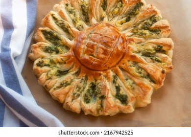 Delicious Pie With Spinach And Ricotta Cheese In The Shape Of A Sunflower