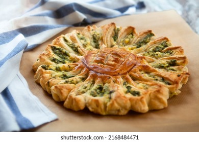 Delicious Pie With Spinach And Ricotta Cheese In The Shape Of A Sunflower.