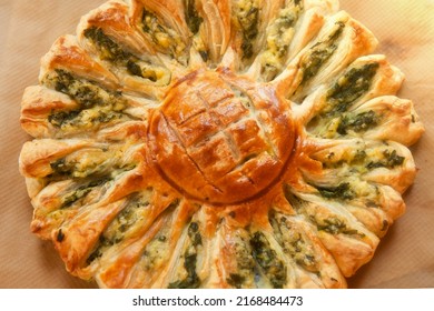 Delicious Pie With Spinach And Ricotta Cheese In The Shape Of A Sunflower.