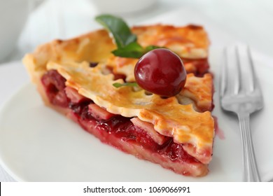 Delicious Piece Of Cherry Pie On Plate