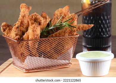 Delicious Pieces Of Fried Fish Breaded With Panko Flour Served With Herb Sauce, Cod.