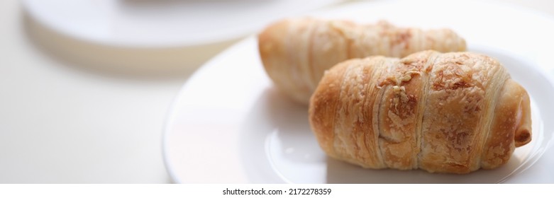 Delicious Pigs In A Blanket On A White Plate